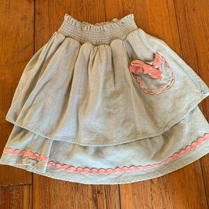 Matilda Jane girls skirt size 8. Goes with the two tops seen in the pictures.